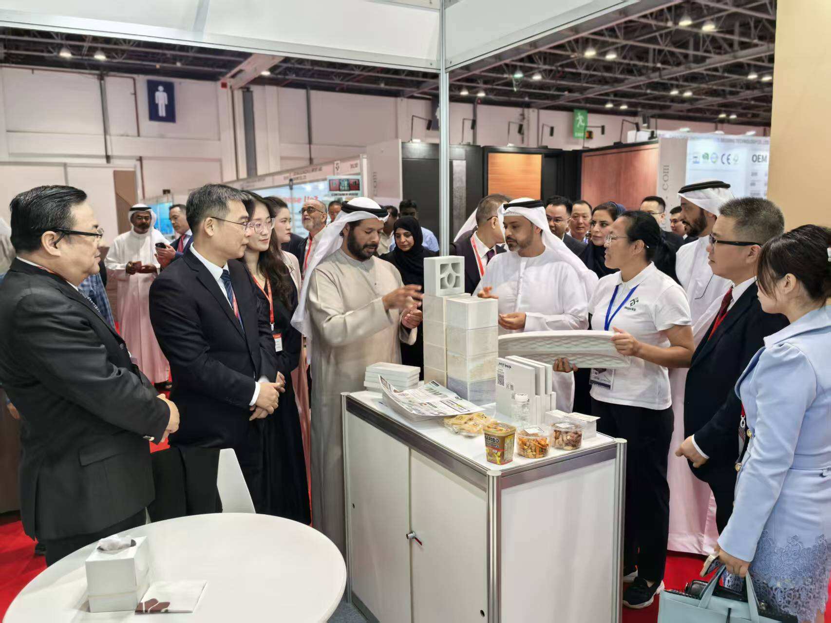 Senior officials from Dubai Municipality reviewing Mega products at the booth